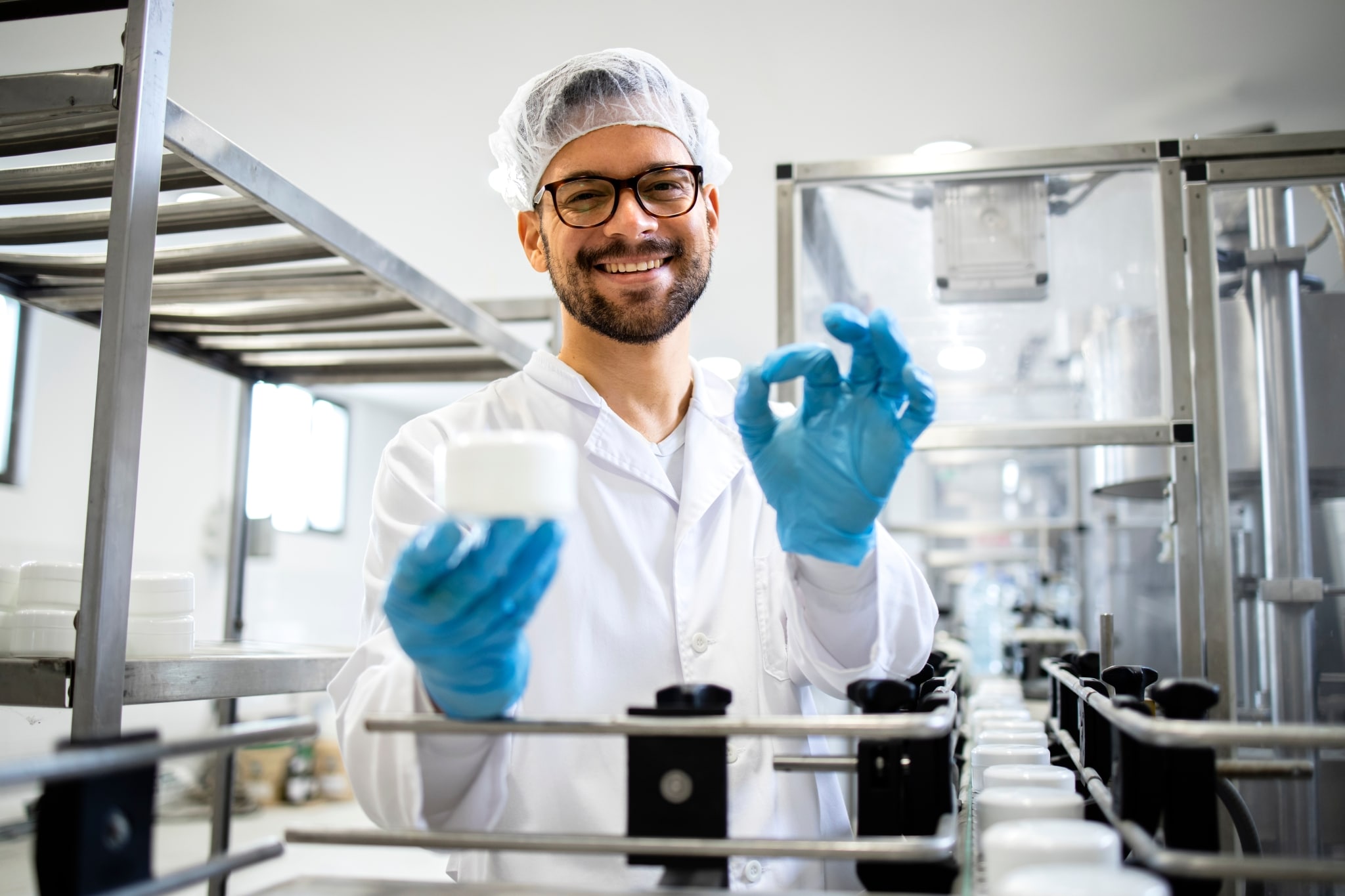 Male Sterile Processing Technician in a lab